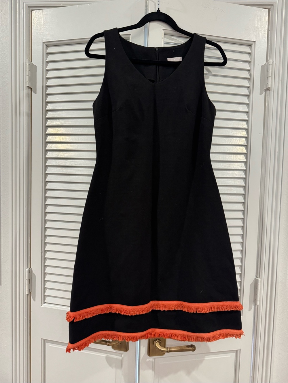 Black Sleeveless Mini Dress with Orange Fringe Hem